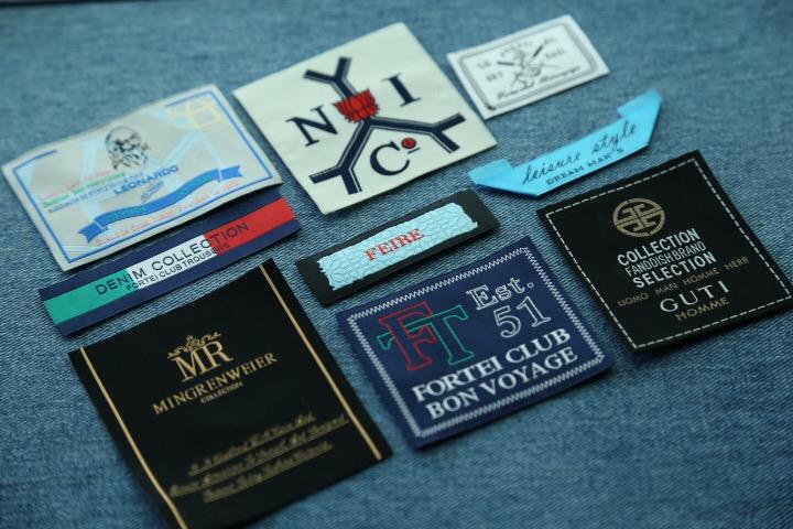 Embossed brand name distinctive fashion woven label for clothing